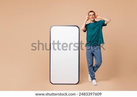 Similar – Image, Stock Photo beige wireless headphones on a purple background