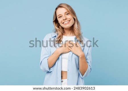 Similar – Image, Stock Photo Blond girl and a blond Labrador sitting on a wall with graffiti on the beach