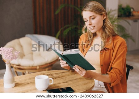 Similar – Image, Stock Photo Girl Reading Book in Train