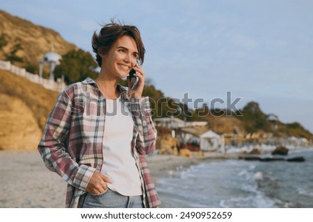 Similar – Image, Stock Photo Woman talking by phone on bed in morning.