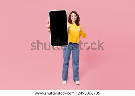 Similar – Image, Stock Photo Young woman holding yellow reusable bottle