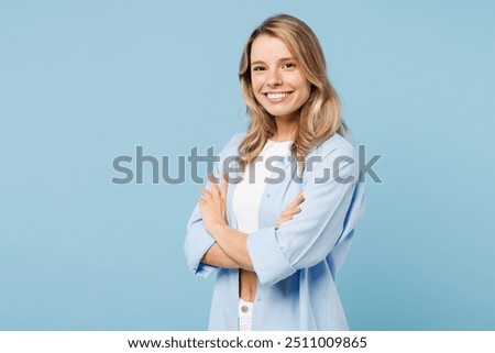 Image, Stock Photo Blond girl and a blond Labrador sitting on a wall with graffiti on the beach