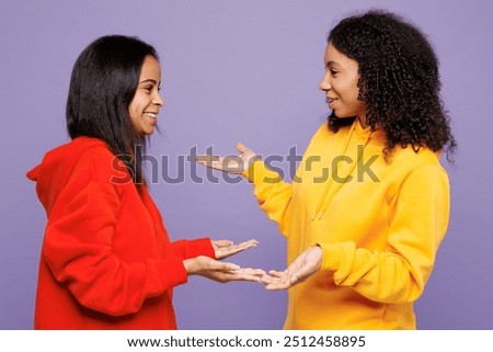 Similar – Image, Stock Photo A cool couple chatting in a beach in the sunset time