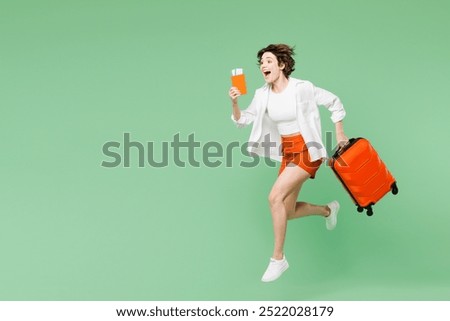 Similar – Image, Stock Photo Traveling woman with suitcase in airport