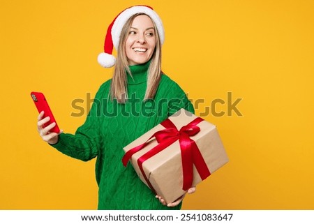 Image, Stock Photo Young woman wearing green oversize sweater enjoying a windy day in a colorful city