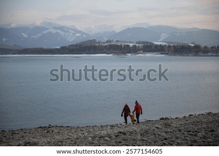 Similar – Foto Bild Felsenküste und friedliches Meer bei Sonnenuntergang