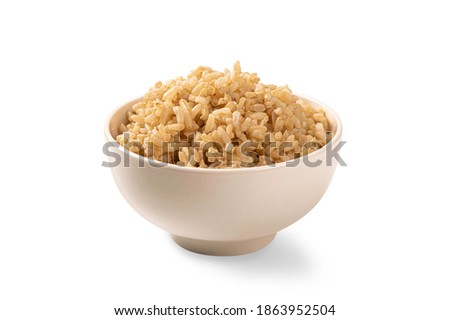 Brown rice in white cup isolated on white background.