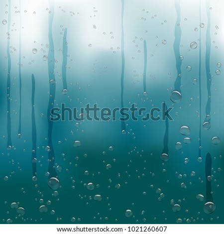 Rain water drops flow down on dark blue background. Beautiful fresh aqua bubble shape natural droplets backdrop. Rain bubbles template on a surface