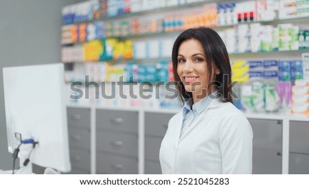 Similar – Image, Stock Photo Concentrated female cashier in face mask working with cash till