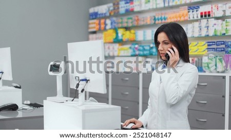 Similar – Image, Stock Photo Concentrated female cashier in face mask working with cash till