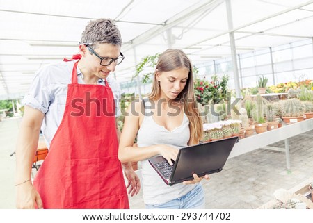young couple of flower sellers upgrade your computer