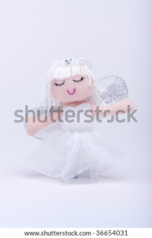 Christmas angel isolated against light graduated background