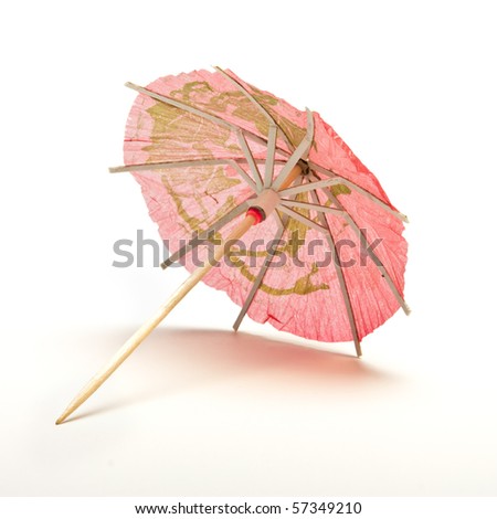 Cocktail Umbrella from low perspective isolated against white background.