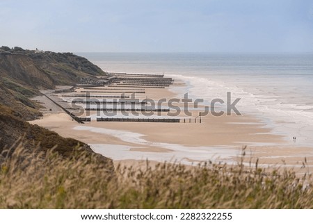Similar – Image, Stock Photo Groynes on the coast of the Baltic Sea near Kühlungsborn