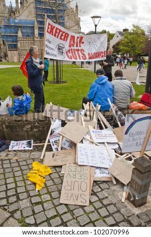 EXETER - MAY 7: Stacks of placards piled up at Exeter Cathedral Yard as part of the May Day rally against the coalition governments spending cuts on May 7, 2012 in Exeter, UK