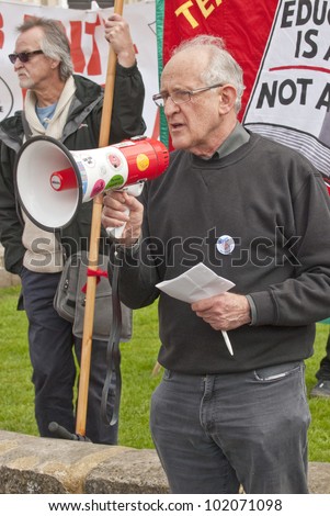 EXETER - MAY 7: Jeff Barr speaking at Exeter Cathedral Yard as part of the May Day rally against the coalition governments spending cuts. on May 7, 2012 in Exeter, UK