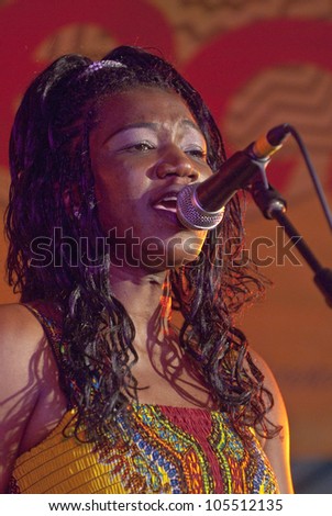 EXETER - JUNE 3: Fatou Hall from Exmouth based band Dakar Audio Club performing live in the World Big Top at the Exeter Respect Festival 2012 on June 3, 2012 in Exeter, UK