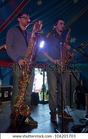 EXETER - JUNE 3: Josef Stout and  John McNaughton from the Afro-Funk band Bronzehead performing live in the World Big Top at the Exeter Respect Festival 2012 on June 3, 2012 in Exeter, UK