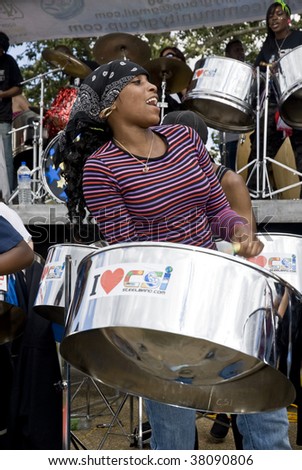 Hyde Park, London-August 29: Band member from  CIS Band Trust playing steel drum at the Notting Hill Panorama Championships, 29th August 2009 in Central London