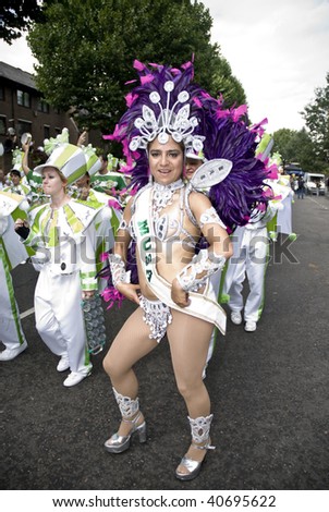 LONDON - AUGUST 31: A dancer from the London School of Samba in the Notting Hill Carnival on August 31, 2009 in London, England.