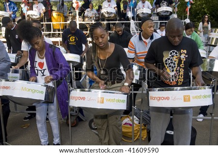 LONDON – AUGUST 29: Steel-drummers from the West Eleven & Mangrove steelband play steel drums at the Notting Hill Panorama Championships on August 29, 2009 in Hyde Park, London, England.