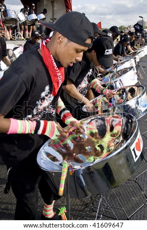 LONDON – AUGUST 29: Steel-drummers from the CIS Band Trust play steel drums at the Notting Hill Panorama Championships on August 29, 2009 in Hyde Park, London, England.