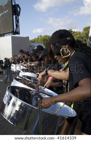 LONDON - AUGUST 29: Steel-drummer from CIS Band Trust playing steel drums at the Notting Hill Panorama Championships on August 29, 2009 in Hyde Park, London, England.
