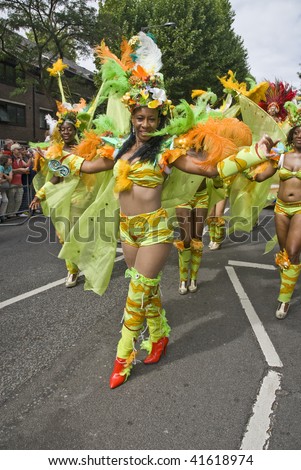LONDON - AUGUST 31: Dancers from the Paraiso School of Samba float dancing on the street at the Notting Hill Carnival on August 31, 2009 in London, England.