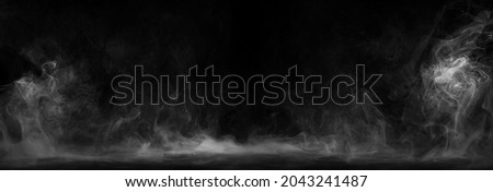 Panoramic view of the abstract fog. White cloudiness, mist or smog moves on black background. Beautiful swirling gray smoke. Mockup for your logo. Wide angle horizontal wallpaper or web banner. 商業照片 © 