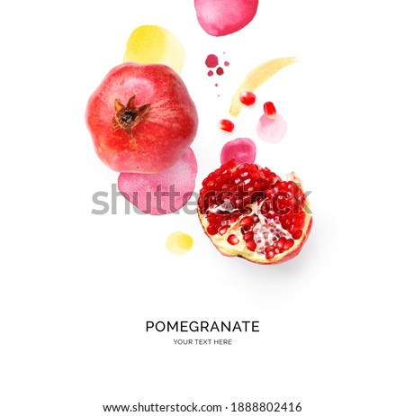 Creative layout made of pomegranate on the watercolor background. Flat lay. Food concept.
