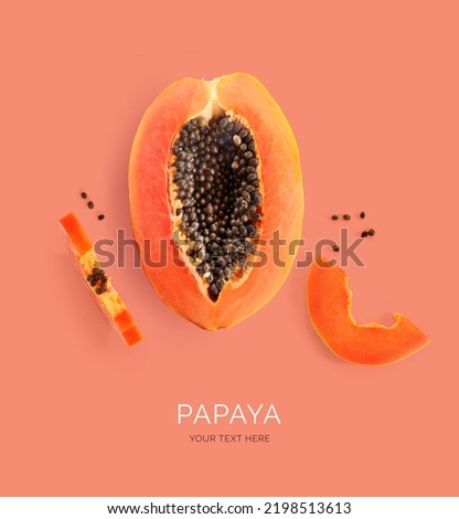 Creative layout made of papaya on the orange background. Flat lay. Food concept. Macro  concept.   商業照片 © 