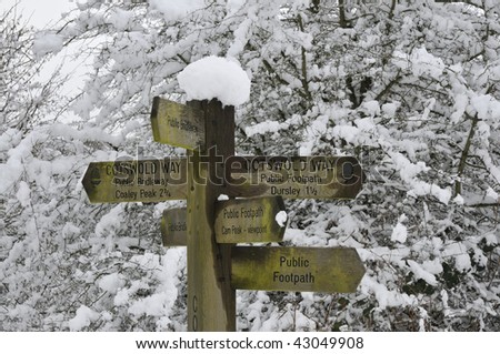 Cotswold Way footpath sign in snow