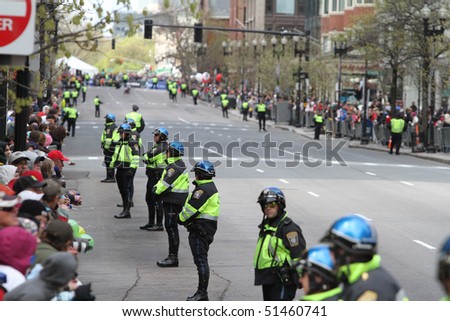 BOSTON - APRIL 19: Boston police line Boylston street expecting the leaders of the Boston Marathon to appear on April 19, 2010 in Boston, MA.