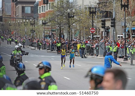 BOSTON - APRIL 19:  Salina Kosgei (KEN) [L] and Waynishet Girma (ETH) [R] vie for third place in the Boston Marathon on April 19, 2010 in Boston, MA