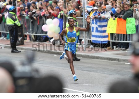 BOSTON - APRIL 19:  Tekeste Kebede (ETH) in second place near finish line at Boston Marathon on April 19, 2010 in Boston, MA.