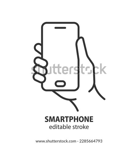 Smartphone line icon. Mobile phone in hand outline vector symbol. Editable stroke.