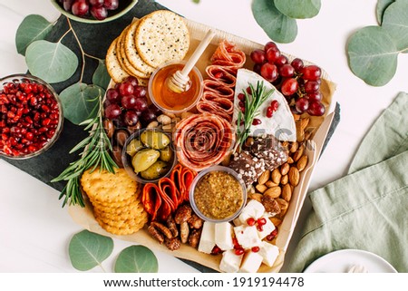 Bright and Colorful Charcuterie Boards and Boxes Fruit, Meat and Cheese