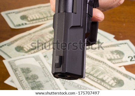 Robbery with the use of a gun.