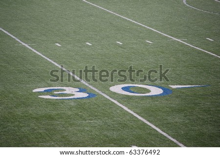 Thirty yards of the mark on the field for the game of American football.