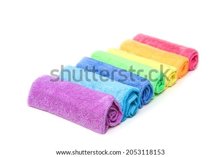 The row of the different colorful micro fibre rags ordered in a white background.  Imagine de stoc © 
