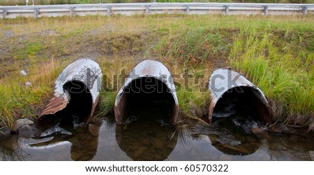 Entry of water into three culverts side by side