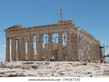 ATHENS, GREECE - May 16: Tourists in famous old city Acropolis on May 16, 2014 in Athens, Greece.
