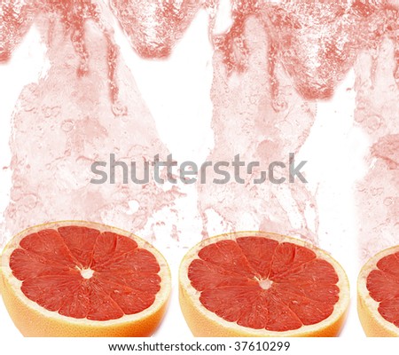 slices of red grapefruit with splash juice