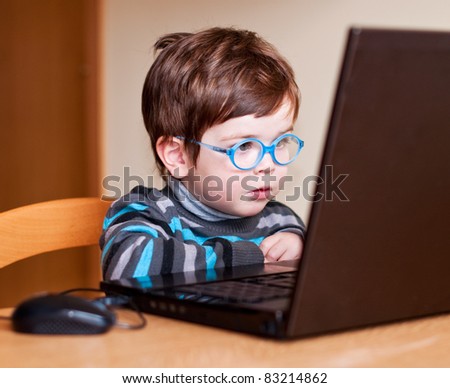 Little Child Wearing Glasses Using Computer Stock Photo 83214862 ...