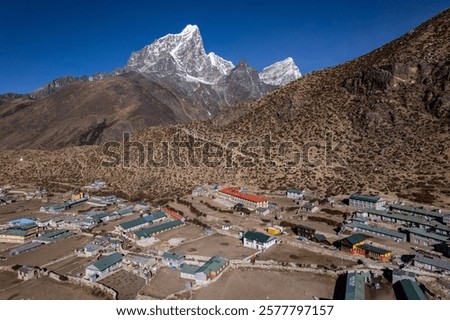Similar – Image, Stock Photo Small village located in mountainous terrain