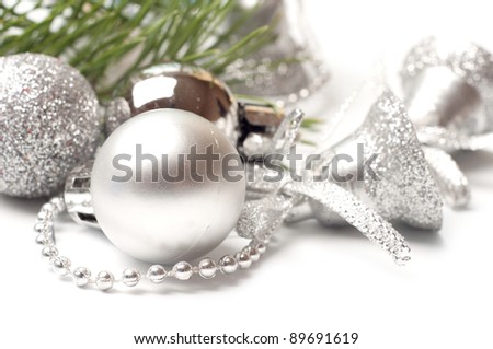 Christmas background with white balls and silver bell