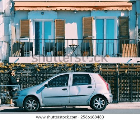 Similar – Image, Stock Photo Summery street from the frog’s eye view. On the horizon trees in sunlight and blue sky with a few clouds.