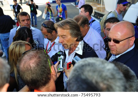 MONZA, ITALY - SEPTEMBER 11 : Chairman of Ferrari, Luca di Montezemolo is giving an interview during the Formula One 2010 at Monza circuit. September 11, 2010 in Monza, Italy