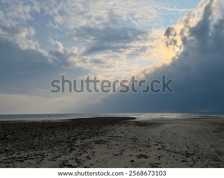 Similar – Image, Stock Photo Sunset sky over coastal city and sea