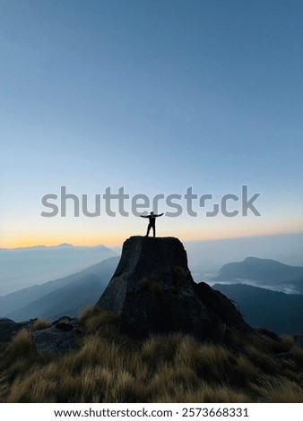 Similar – Foto Bild Auf Stein stehender Junge mit VR-Brille gegen Berg